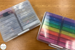 clear and rainbow cases used to store science task cards