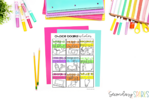Choice board on colored cardtsock with notebooks, markers and a pencil