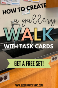 Task cards taped to a wall for a gallery walk classroom activity