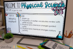 "Welcome to Physical Science" agenda slides on a large screen with school supplies